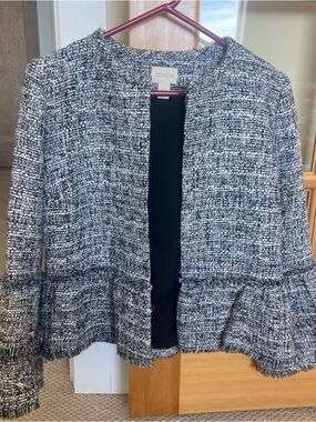 Chico's Black & White Tweed Peplum Jacket
Oversized with bell sleeves.  Lined